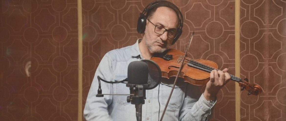 Violinist Mohammad Mahmood rehearsing, Nineveh Operetta