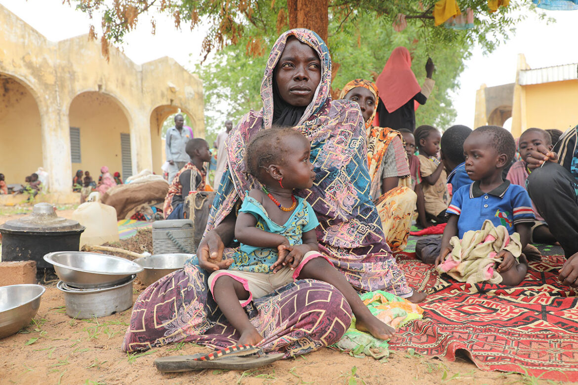 A Sudanese refugee woman in the yard of a secondary school in Chad
