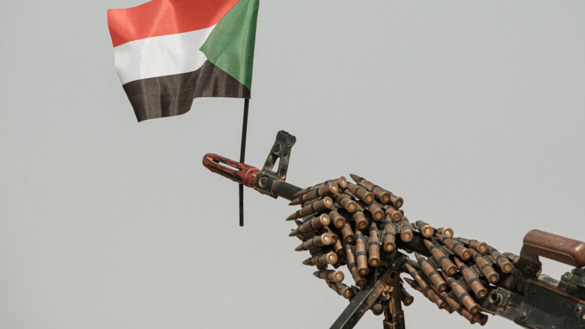 Sudanese national flag attached to machine gun of paramilitary RSF soldier